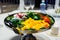 Metal tray with sliced fresh vegetables.