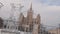 Metal trusses construction in front of Moscow State University covered in snow