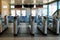 Metal turnstiles with glass doors at the entrance to the subway or railway station.