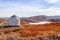 Metal US bunker and autumn greenlandic orange tundra landscape w