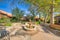 Metal and wood benches with fountain at the middle outside the residences in Tucson, Arizona