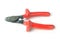 Metall wire cutters with red rubber handles isolated on white background