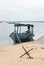 Metallic anchor fixing a boat in an island