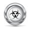 Metallic button with a hazard sign. vector