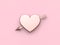Metallic heart arrow pink background valentine concept 3d render