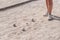 Metallic petanque balls on a fine gravel ground