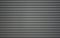 Metallic roller shutter door