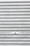 Metallic roller shutter with door lock