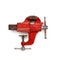 Metalwork tool - red vintage mechanical hand vise clamp on white background