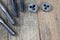 Metalwork tools on the workshop table. Threading dies and taps i