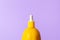 Metaphor, bottle with vegetable serum for skin , butter - lemon. The concept - serum with vitamin C in cosmetics and aromatherapy