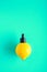 Metaphor, bottle with whey, butter in lemon. The concept of vitamin C in cosmetics and aromatherapy.