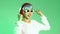 Metaverse music world concept, young asian woman wearing white glasses ang red headphone listen to music and dancing