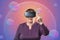 Metaverse. Portrait of senior woman pensioner in VR glasses touching digital sphere with shopping. Modern technology