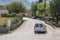 Meteora, Greece - September 19, 2018: Locals and tourists driving on automobile, car. vehicles. Road in Meteora