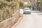 Meteora, Greece - September 19, 2018: Locals and tourists driving on automobile, car. vehicles. Road in Meteora