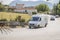 Meteora, Greece - September 19, 2018: Locals and tourists driving on automobile, car. vehicles. Road in Meteora