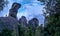 Meteora - Silhouette of man standing next to a massive rock formation near village Kastraki, Meteora, Greece