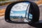 Meteora and Thessaly valley seen on the rearview mirror, Greece