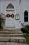 Methodist church doors with autumn wreaths