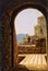 Methoni Castle viewed through a medieval archway.
