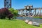 Metra Train Crossing a Railroad Bridge over the Chicago River seen from Ping Tom Memorial Park in Chinatown Chicago