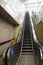 Metro escalators going upwards, in delhi. Escalator stepping towards the exit gate.