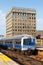 Metro-North Railroad commuter train public transport at Harlem 125th Street railway station portrait format in New York, United