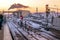 Metro station on the background of urban landscape in winter with snow and rails with traffic lights