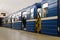 The metro train stopped at the station. The doors of the car are open and passengers are waiting for departure. Saint-Petersburg.