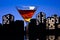 Metropolis Manhattan cocktail in city skyline setting