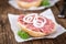 Mett on a bun (German cuisine; selective focus)