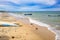 Mexican beach coastal landscape, rowboat on sand, others in waters