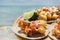 Mexican breaded shrimp tacos with sauce and lime