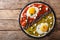 Mexican breakfast: eggs huevos divorciados with beans Frijoles r