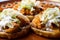 Mexican chicken Tinga sopes