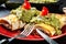 Mexican chimichanga with guacamole dip