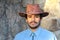 Mexican cowboy wearing hat and denim shirt