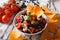 Mexican cuisine: tasty salsa and corn chips nachos close-up. Hor