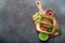 Mexican dish fajita tacos on wooden cutting board from above copy space