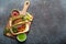 Mexican dish fajita tacos on wooden cutting board from above copy space