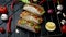 The Mexican dish of Tako corn flat cake with vegetable filling on a wooden board on black background