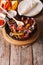 Mexican fajitas and ingredients vertical view above, rustic