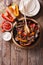 Mexican fajitas on a table, rustic style vertical top view