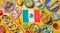 Mexican festive food for independence day independencia - around mexican flag. Top view , Yellow background