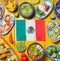 Mexican festive food for independence day independencia - around mexican flag. Top view , Yellow background