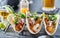 Mexican fish tacos in metal tray