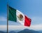 Mexican flag waving in the wind isolated Mexico