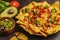 Mexican food concept. Nachos - yellow corn totopos chips with va