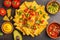 Mexican food concept. Nachos - yellow corn totopos chips with va